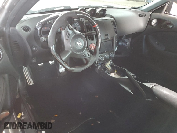 2015 Nissan 370Z Nismo z VIN JN1AZ4EH1FM441060, wystawiony jako Copart lot #53423725 z przebiegiem Nie podano mil oraz Szkoda całkowita • Salvage title. Historia ofert i sprzedaży dostępna na DreamBid. Obrazek 8.