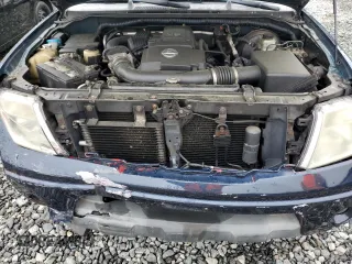 2006 Nissan Pathfinder SE z VIN 5N1AR18W66C610092, wystawiony jako Copart lot #60208105 z przebiegiem 235 876 mil mil oraz Czysty tytuł • Clean title. Historia ofert i sprzedaży dostępna na DreamBid. Obrazek 12.