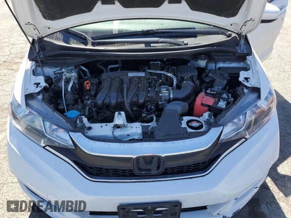 2020 Honda Fit LX z VIN 3HGGK5H46LM709984, wystawiony jako Copart lot #58268405 z przebiegiem 70 003 mil mil oraz Szkoda całkowita • Salvage title. Historia ofert i sprzedaży dostępna na DreamBid. Obrazek 11.