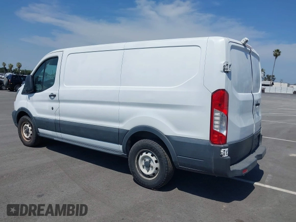 2016 Ford Transit Cargo with VIN 1FTYE1YM5GKB35426, listed as a IAAI auction lot 42402672 with 211,505 mi miles and . Bid and sale history available at DreamBid. Image 3.