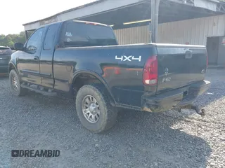 2003 Ford F-150 XL with VIN 2FTRX18L33CA96940, listed as a IAAI auction lot 42090248 with 229,260 mi miles. Bid and sale history available at carsss.com. Image 3.