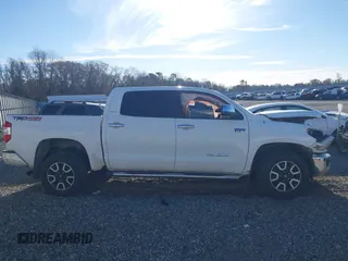 2014 Toyota Tundra 4WD Truck LTD with VIN 5TFHW5F16EX372679, listed as a IAAI auction lot 41736049 with 247,000 mi miles. Bid and sale history available at carsss.com. Image 13.
