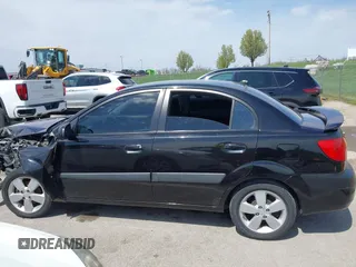 2008 Kia Rio LX with VIN KNADE123X86323641, listed as a IAAI auction lot 41985631 with 175,102 mi miles and . Bid and sale history available at DreamBid. Image 13.