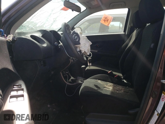 2012 Scion xD with VIN JTKKU4B45C1024533, listed as a Copart auction lot 63619703 with 126,806 mi miles and Non Repairable. Bid and sale history available at DreamBid. Image 7.