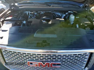 2015 GMC Yukon Denali with VIN 1GKS1CKJ7FR132677, listed as a Copart auction lot 47820925 with 144,821 mi miles and Salvage Title. Bid and sale history available at carsss.com. Image 12.
