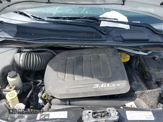 2013 Chrysler Town & Country S with VIN 2C4RC1HG6DR818396, listed as a IAAI auction lot 41922016 with 231,595 mi miles. Bid and sale history available at carsss.com. Image 10.