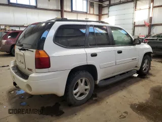 2004 GMC Envoy SLT with VIN 1GKDT13S042257444, listed as a Copart auction lot 89137605 with 301,920 mi miles and Salvage Title. Bid and sale history available at carsss.com. Image 3.