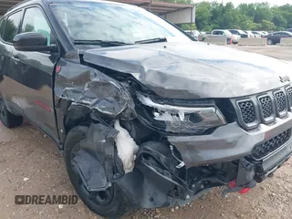 2023 Jeep Compass Trailhawk with VIN 3C4NJDDN9PT544283, listed as a IAAI auction lot 42393021 with 60,009 mi miles and . Bid and sale history available at DreamBid. Image 6.