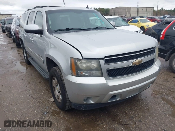 2011 Chevrolet Suburban LS with VIN 1GNSCHE06BR188407, listed as a IAAI auction lot 41453215 with 232,667 mi miles. Bid and sale history available at carsss.com. Image 1.