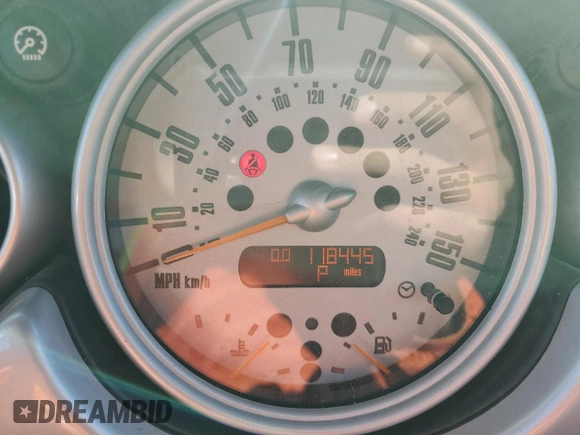 2005 MINI Convertible с VIN WMWRF33485TG10403, выставлен на аукционе Copart как лот 52459735 с пробегом 118 445 миль миль и Чистый • Clean title. История ставок и продаж доступна на DreamBid. Изображение 9.