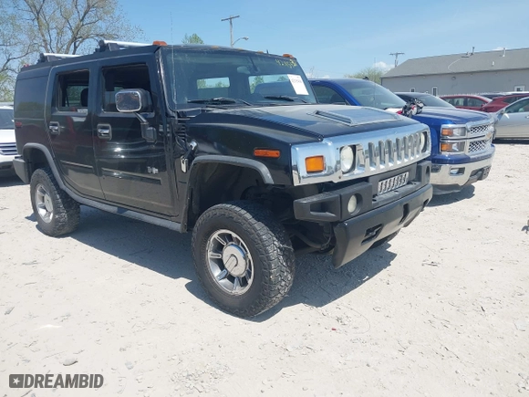 2005 Hummer H2 SUV with VIN 5GRGN23U25H128791, listed as a IAAI auction lot 42115436 with 286,818 mi miles. Bid and sale history available at carsss.com. Image 1.