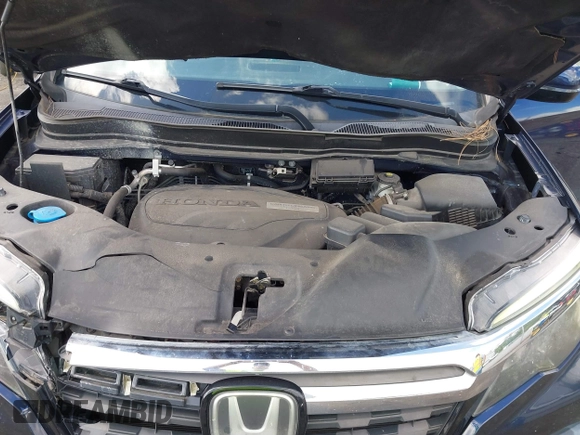 2019 Honda Ridgeline RTL-E with VIN 5FPYK3F76KB010613, listed as a IAAI auction lot 42079810 with 90,492 mi miles and . Bid and sale history available at DreamBid. Image 10.