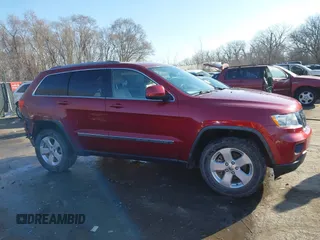 2012 Jeep Grand Cherokee Laredo with VIN 1C4RJFAG3CC163764, listed as a IAAI auction lot 41719137 with 198,827 mi miles. Bid and sale history available at carsss.com. Image 14.
