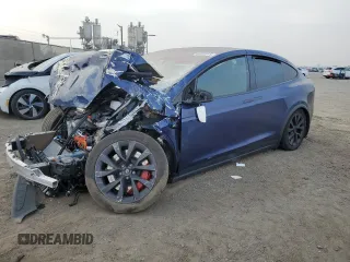 2023 Tesla Model X Plaid with VIN 7SAXCBE64PF425167, listed as a Copart auction lot 84039274 with Not Provided miles and Salvage Title. Bid and sale history available at DreamBid. Image 1.