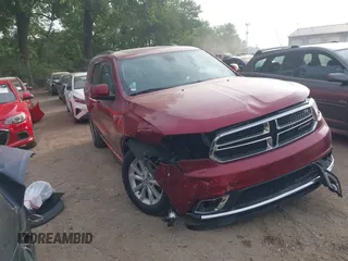2015 Dodge Durango SXT with VIN 1C4RDJAGXFC954131, listed as a IAAI auction lot 42506112 with 137,308 mi miles and . Bid and sale history available at DreamBid. Image 1.
