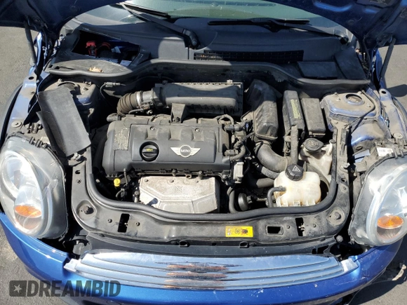 2012 MINI Hardtop with VIN WMWSU3C53CT257126, listed as a Copart auction lot 52146465 with 146,485 mi miles and Salvage Title. Bid and sale history available at DreamBid. Image 11.