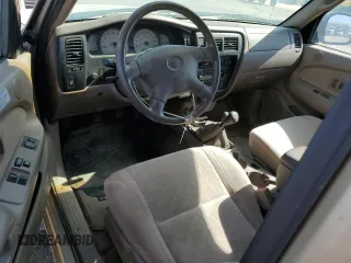 2002 Toyota Tacoma z VIN 5TEWN72N62Z899270, wystawiony jako Copart lot #54070605 z przebiegiem 243 516 mil mil oraz Czysty tytuł • Clean title. Historia ofert i sprzedaży dostępna na DreamBid. Obrazek 8.