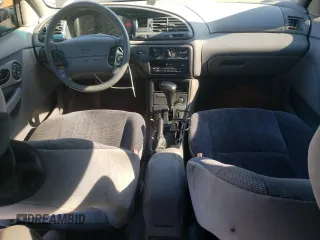 1996 Ford Contour z VIN 1FALP65L5TK212857, wystawiony jako Copart lot #76701614 z przebiegiem 74 994 mil mil oraz Szkody całkowita. Historia ofert i sprzedaży dostępna na DreamBid. Obrazek 8.