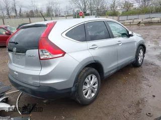2014 Honda CR-V EX with VIN 5J6RM4H50EL065014, listed as a IAAI auction lot 41945795 with 163,677 mi miles and . Bid and sale history available at carsss.com. Image 4.