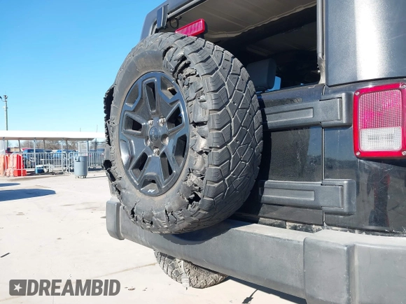 2008 Jeep Wrangler Unlimited Rubicon with VIN 1J8GA69198L574593, listed as a IAAI auction lot 41412045 with 174,727 mi miles and . Bid and sale history available at DreamBid. Image 20.
