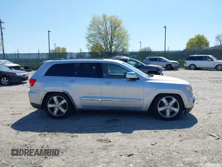 2011 Jeep Grand Cherokee Overland z VIN 1J4RR6GT6BC568491, wystawiony jako IAAI lot #42035464 z przebiegiem 147 389 mil mil oraz . Historia ofert i sprzedaży dostępna na DreamBid. Obrazek 13.