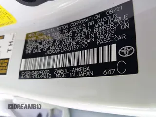 2022 Toyota Prius L Eco with VIN JTDKAMFUXN3159170, listed as a IAAI auction lot 41930288 with 53,414 mi miles and . Bid and sale history available at DreamBid. Image 9.