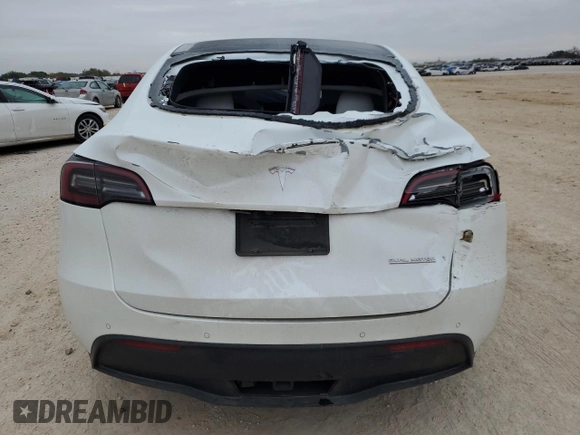 2021 Tesla Model Y Performance z VIN 5YJYGDEF0MF267326, wystawiony jako Copart lot #52319925 z przebiegiem Nie podano mil oraz Szkoda całkowita • Salvage title. Historia ofert i sprzedaży dostępna na DreamBid. Obrazek 6.