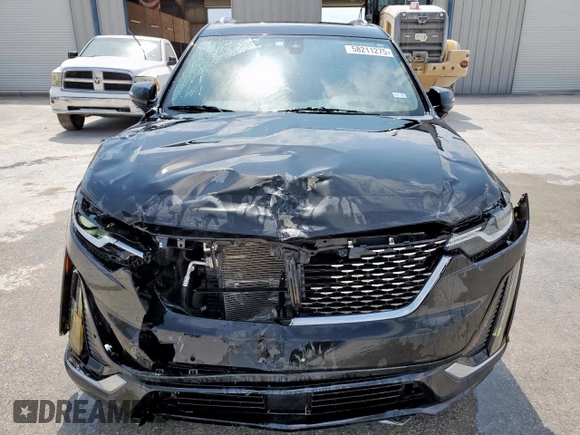 2020 Cadillac XT6 FWD Premium Luxury с VIN 1GYKPCRSXLZ104502, выставлен на аукционе Copart как лот 58211275 с пробегом 97 053 миль миль и Списание • Salvage title. История ставок и продаж доступна на DreamBid. Изображение 5.
