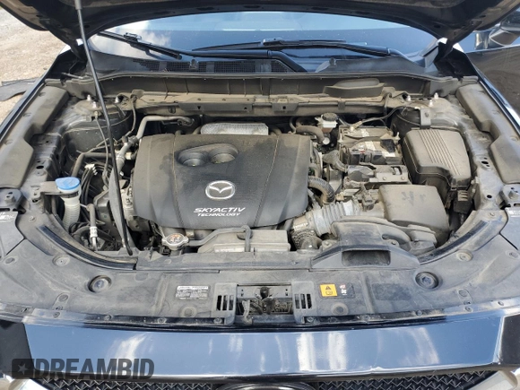 2017 Mazda CX-5 Grand Touring with VIN JM3KFBDL2H0197831, listed as a Copart auction lot 43150335 with 126,847 mi miles and Salvage Title. Bid and sale history available at carsss.com. Image 12.
