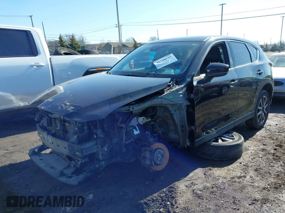 2018 Mazda CX-5 Grand Touring with VIN JM3KFBDM5J0441518, listed as a IAAI auction lot 41748941 with 64,639 mi miles. Bid and sale history available at carsss.com. Image 2.