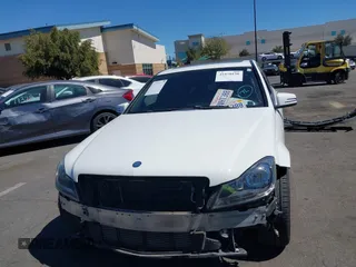 2014 Mercedes-Benz C C 250 Sport with VIN WDDGF4HB3EA965176, listed as a IAAI auction lot 41870150 with 211,085 mi miles. Bid and sale history available at carsss.com. Image 6.