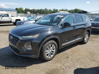 2019 Hyundai Santa Fe SE with VIN 5NMS2CAD8KH135557, listed as a Copart auction lot 65185155 with 74,521 mi miles and Salvage title. Bid and sale history available at DreamBid. Image 1.