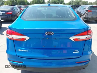 2020 Ford Fusion SE z VIN 3FA6P0HD8LR135668, wystawiony jako IAAI lot #42253008 z przebiegiem 69 625 mil mil oraz . Historia ofert i sprzedaży dostępna na DreamBid. Obrazek 16.