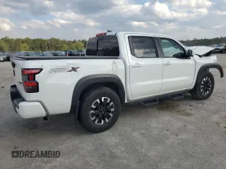 2023 Nissan Frontier Pro-X with VIN 1N6ED1EJ6PN661933, listed as a Copart auction lot 52496135 with 28,533 mi miles and Salvage title. Bid and sale history available at DreamBid. Image 3.