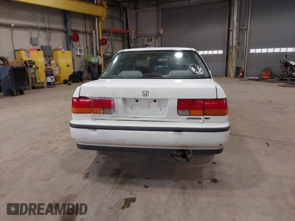 1993 Honda Accord z VIN 1HGCB7651PA022436, wystawiony jako IAAI lot #41785092 z przebiegiem Nie podano mil oraz . Historia ofert i sprzedaży dostępna na DreamBid. Obrazek 16.