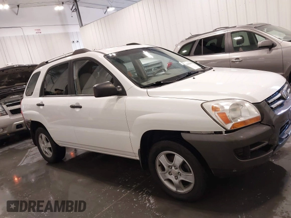 2007 Kia Sportage LX with VIN KNDJF724877399530, listed as a IAAI auction lot 41696698 with 124,967 mi miles. Bid and sale history available at carsss.com. Image 13.