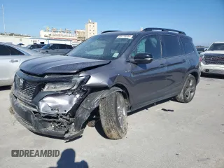 2021 Honda Passport Touring z VIN 5FNYF7H94MB001771, wystawiony jako Copart lot #85773354 z przebiegiem Nie podano mil oraz Szkoda całkowita • Salvage title. Historia ofert i sprzedaży dostępna na DreamBid. Obrazek 1.