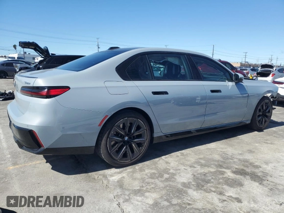 2023 BMW 7 Series 740i with VIN WBA23EH02PCL92695, listed as a Copart auction lot 49352065 with 11,758 mi miles and Salvage title. Bid and sale history available at DreamBid. Image 3.