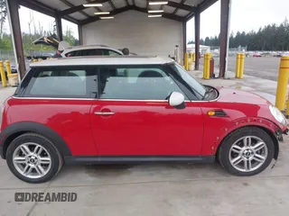2012 MINI Hardtop with VIN WMWSU3C58CT262077, listed as a IAAI auction lot 42140178 with 70,099 mi miles and . Bid and sale history available at DreamBid. Image 14.