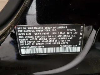 2013 Volkswagen Passat SEL Premium z VIN 1VWCH7A32DC046888, wystawiony jako Copart lot #55735385 z przebiegiem 265 379 mil mil oraz Czysty tytuł • Clean title. Historia ofert i sprzedaży dostępna na DreamBid. Obrazek 12.