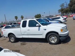 2000 Ford F-150 XL with VIN 1FTRX17L2YNA03263, listed as a IAAI auction lot 42326528 with Not provided miles and . Bid and sale history available at DreamBid. Image 13.