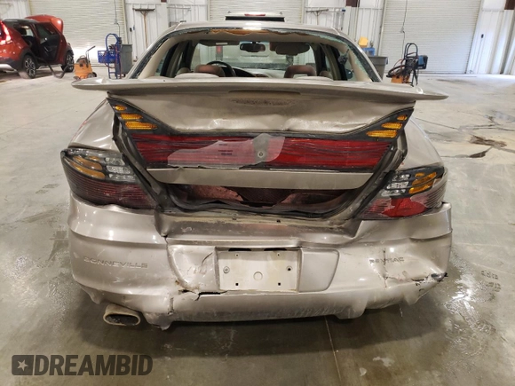 2002 Pontiac Bonneville SLE z VIN 1G2HY54K124211759, wystawiony jako Copart lot #54573555 z przebiegiem 106 409 mil mil oraz Szkoda całkowita • Salvage title. Historia ofert i sprzedaży dostępna na DreamBid. Obrazek 6.