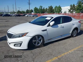 2015 Kia Optima LX with VIN 5XXGM4A70FG381555, listed as a IAAI auction lot 42632259 with 139,644 mi miles and . Bid and sale history available at DreamBid. Image 2.