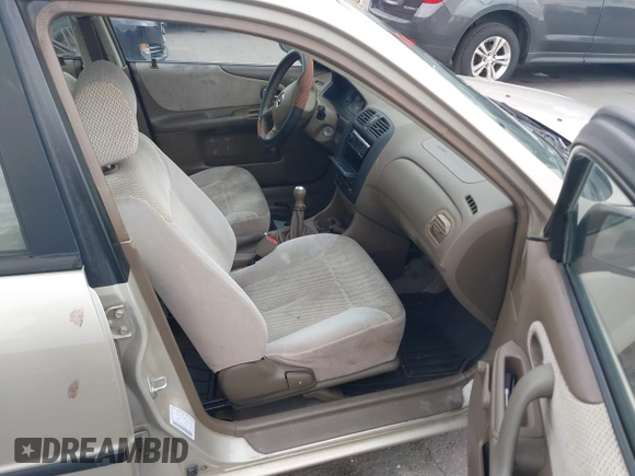 2000 Mazda Protege DX with VIN JM1BJ2227Y0237323, listed as a IAAI auction lot 42179683 with Not Provided miles and . Bid and sale history available at DreamBid. Image 5.