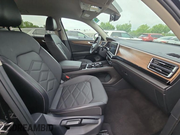 2024 Volkswagen Atlas SE with VIN 1V2HR2CA1RC564839, listed as a IAAI auction lot 42678520 with 21,963 mi miles and . Bid and sale history available at DreamBid. Image 1.