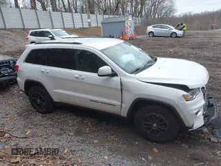 2019 Jeep Grand Cherokee Upland with VIN 1C4RJFAG4KC706571, listed as a IAAI auction lot 41941209 with 72,837 mi miles and . Bid and sale history available at DreamBid. Image 14.