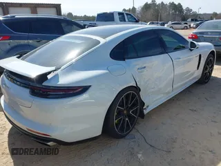 2018 Porsche Panamera 4 E-Hybrid z VIN WP0AE2A73JL129993, wystawiony jako IAAI lot #41602216 z przebiegiem 53 426 mil mil oraz . Historia ofert i sprzedaży dostępna na DreamBid. Obrazek 4.