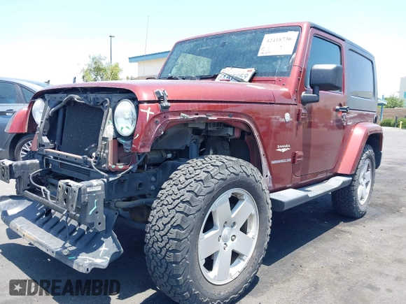 2010 Jeep Wrangler Sahara z VIN 1J4AA5D14AL125062, wystawiony jako IAAI lot #42418736 z przebiegiem 90 839 mil mil oraz . Historia ofert i sprzedaży dostępna na DreamBid. Obrazek 18.