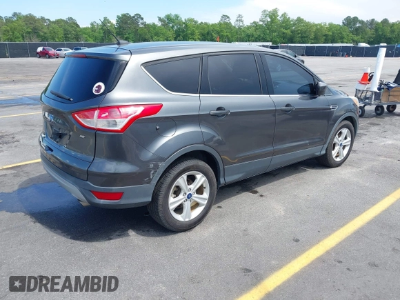 2015 Ford Escape SE with VIN 1FMCU0G75FUC20011, listed as a IAAI auction lot 42113751 with 182,516 mi miles. Bid and sale history available at carsss.com. Image 4.