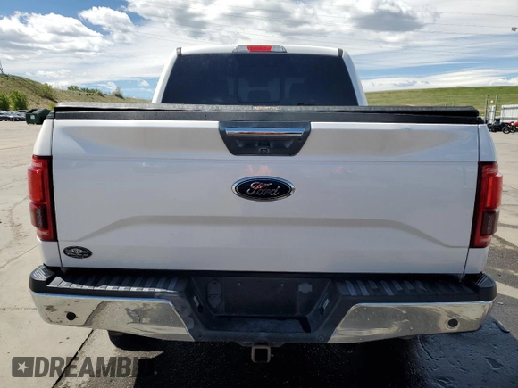 2015 Ford F-150 XLT with VIN 1FTEW1EG4FKD27840, listed as a Copart auction lot 57405215 with 134,036 mi miles and Salvage title. Bid and sale history available at DreamBid. Image 6.